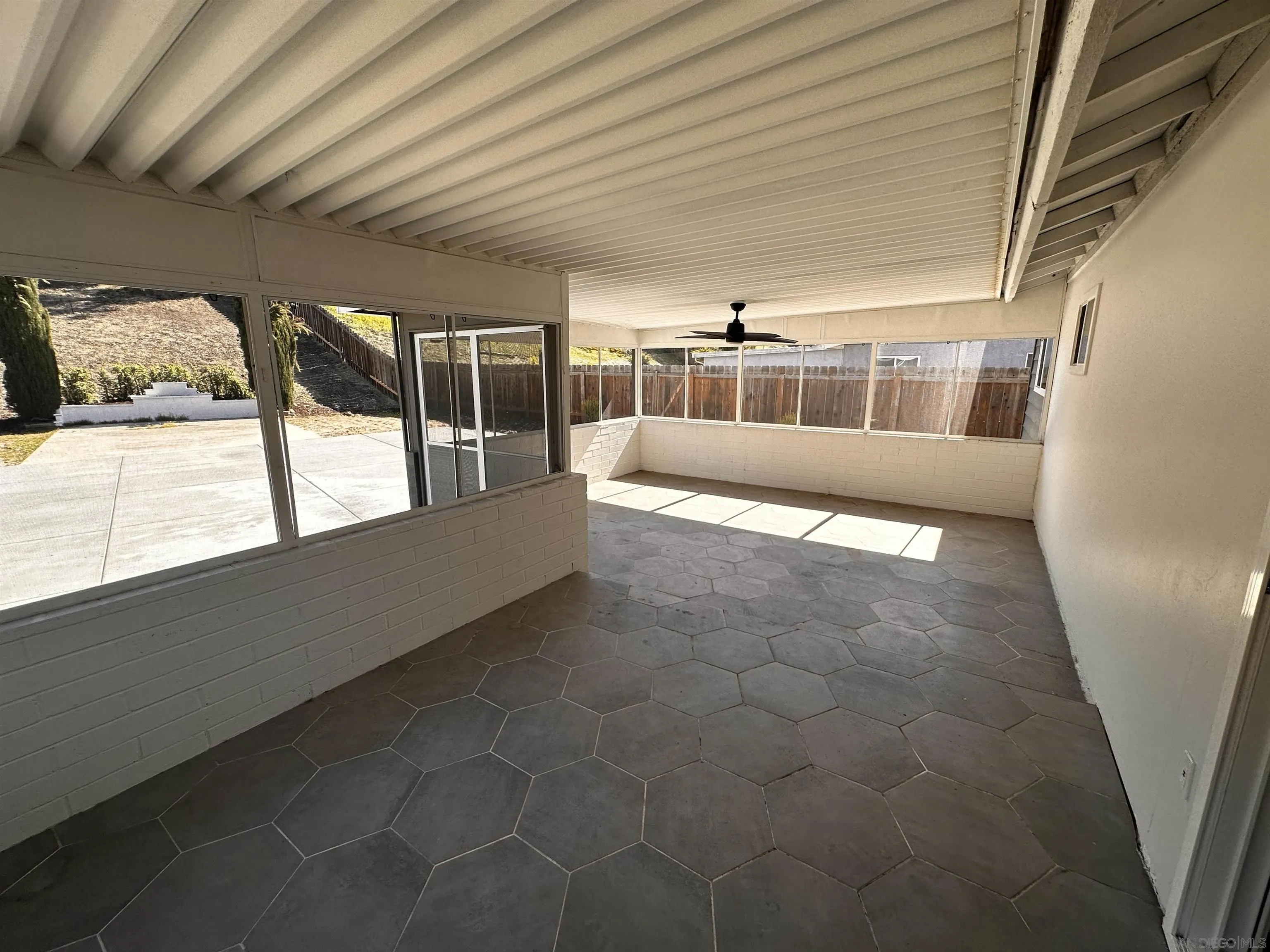 12733 McFeron Road Poway, CA 92064 - Photo 62 of 69 a view of an empty room with windows