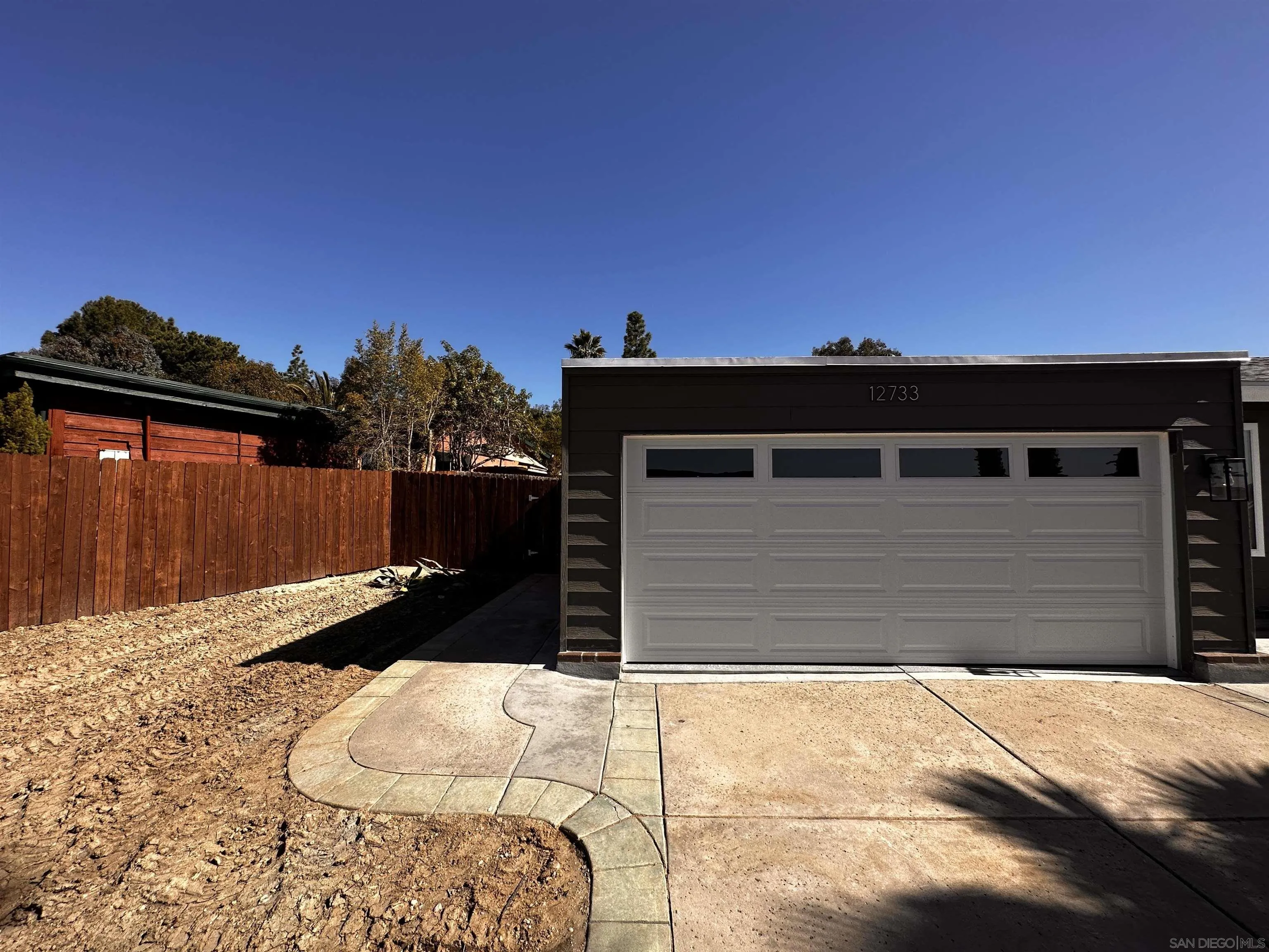 12733 McFeron Road Poway, CA 92064 - Photo 67 of 69 a front view of a house with a yard