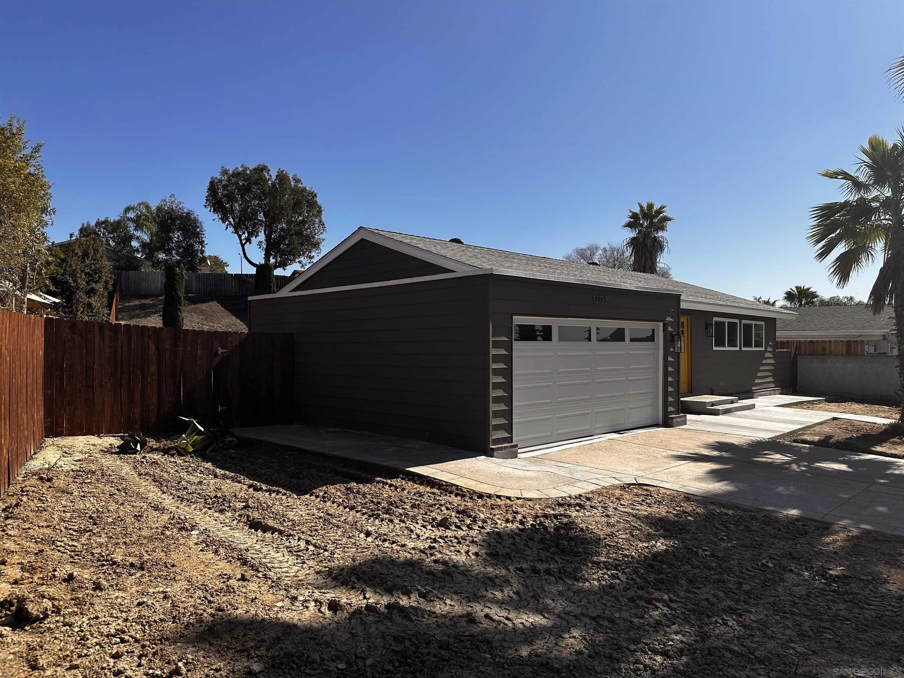 12733 McFeron Road Poway, CA 92064 - Photo 69 of 69 a front view of a house with a yard