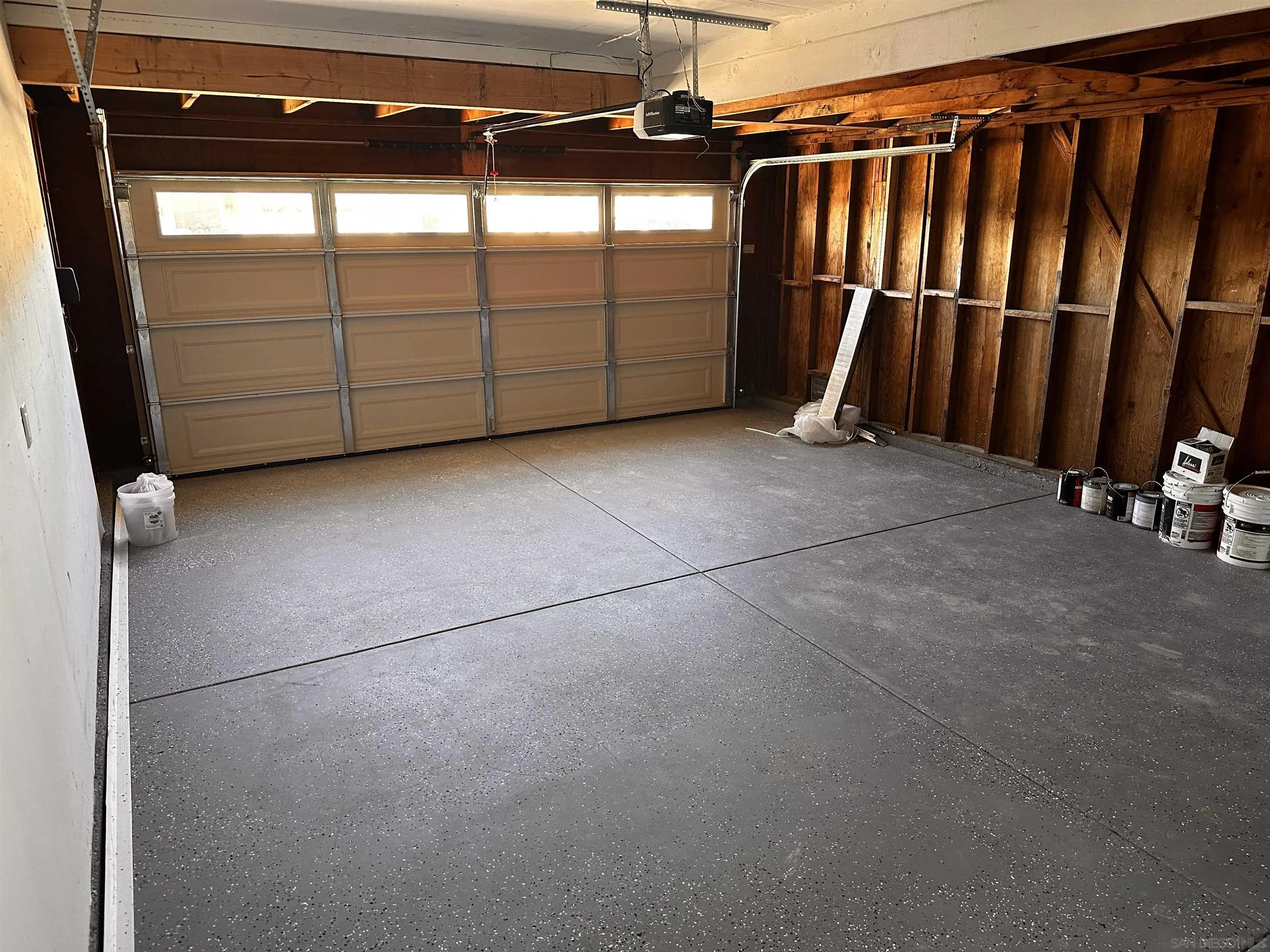 12733 McFeron Road Poway, CA 92064 - Photo 7 of 69 a view of a garage with wooden wall