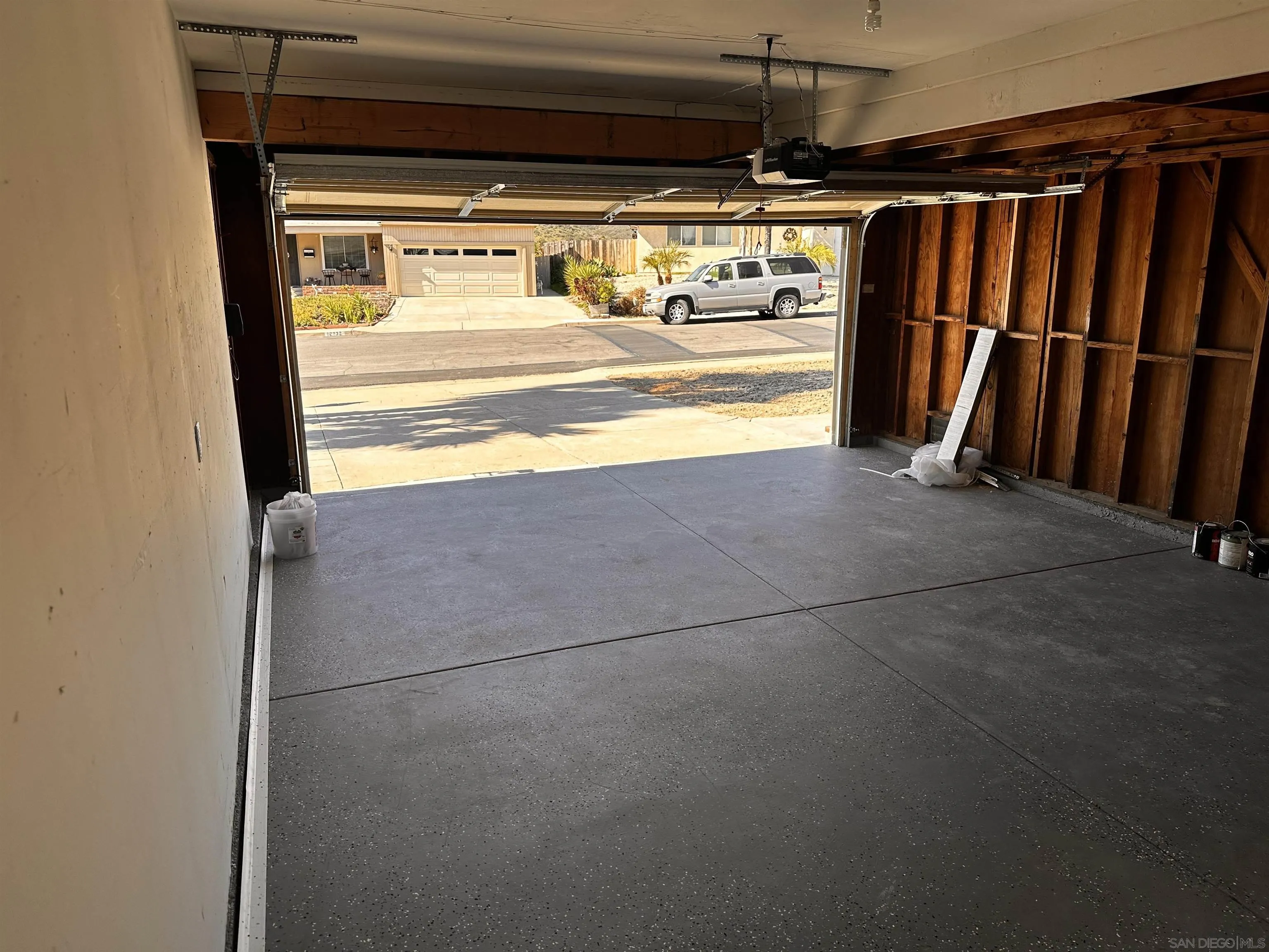 12733 McFeron Road Poway, CA 92064 - Photo 8 of 69 a view of walk in closet with water heater and a refrigerator