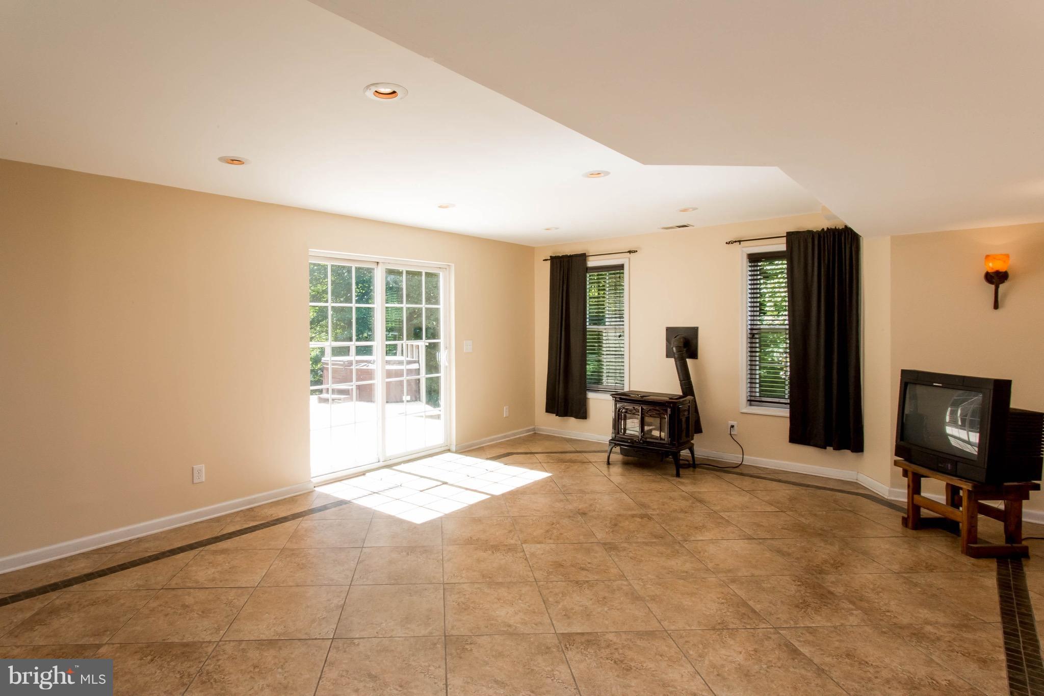 6771 North Stuart Road King George, VA 22485 - Photo 25 of 30 Walk out Basement w/ Pellet Stove