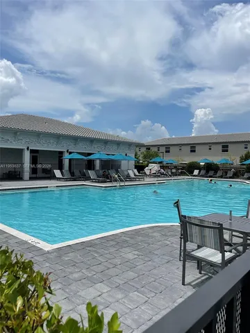 a room with gym equipment and a large window