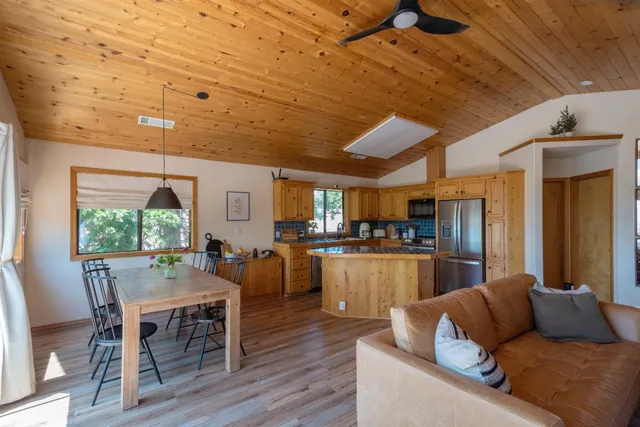 a view of a forest with a yard