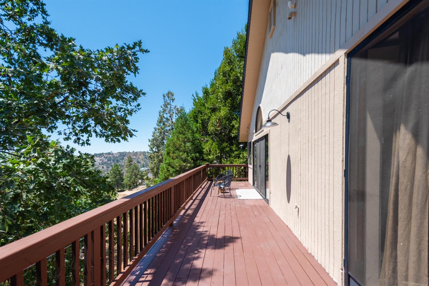 34075 Shaver Springs Road Auberry, CA 93602 - Photo 27 of 38 a view of a balcony with wooden floor