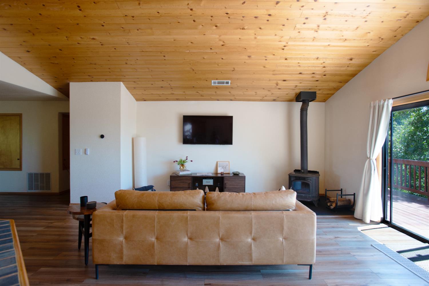 34075 Shaver Springs Road Auberry, CA 93602 - Photo 10 of 38 a living room with furniture and a flat screen tv
