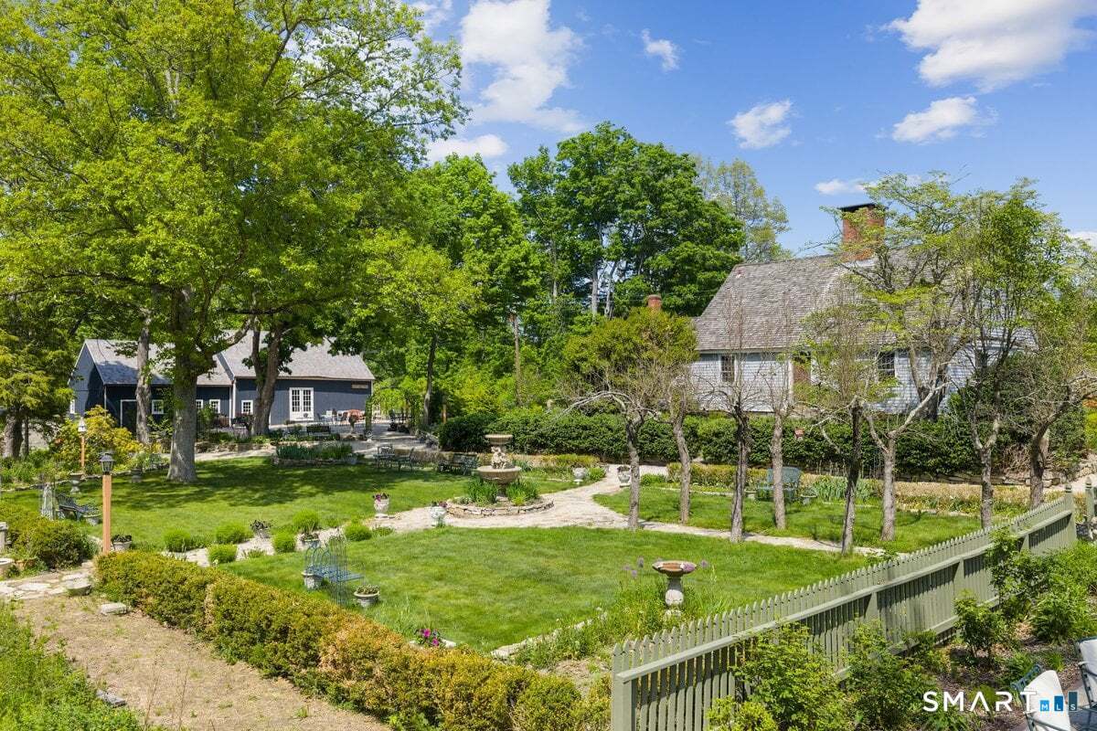 59 Hidden Lake Road Haddam, CT 06441 - Photo 10 of 40 Stone patios & walkways grace the gardens providing multiple seating areas for numerous
