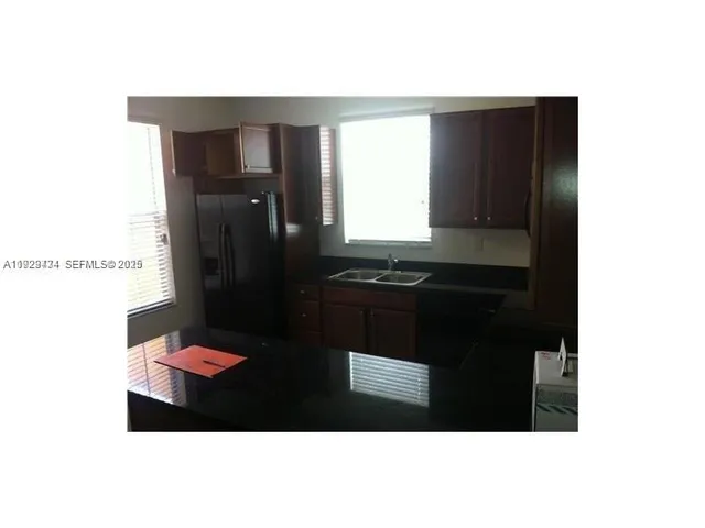 a front view of a house with a porch