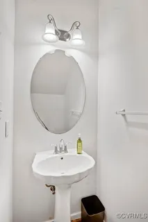 a kitchen with stainless steel appliances granite countertop a sink stove and microwave