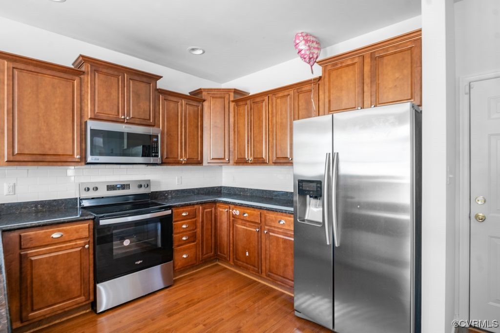 14306 Camack Trail Midlothian, VA 23114 - Photo 20 of 48 a kitchen with stainless steel appliances granite countertop a refrigerator and a stove top oven