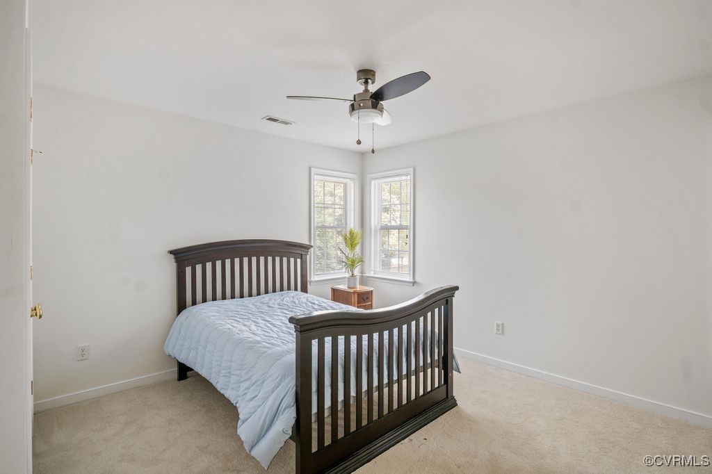 14306 Camack Trail Midlothian, VA 23114 - Photo 26 of 48 a bedroom with a bed and a window