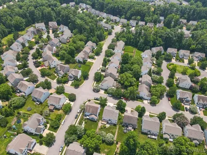 a aerial view of a table and chairs in the patio