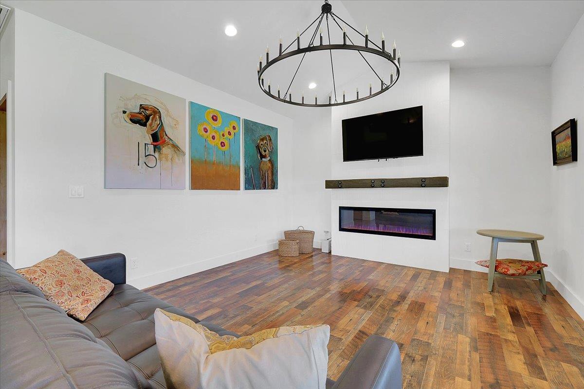 1102 Barry Road Yuba City, CA 95991 - Photo 45 of 88 a bedroom with a bed and a fireplace