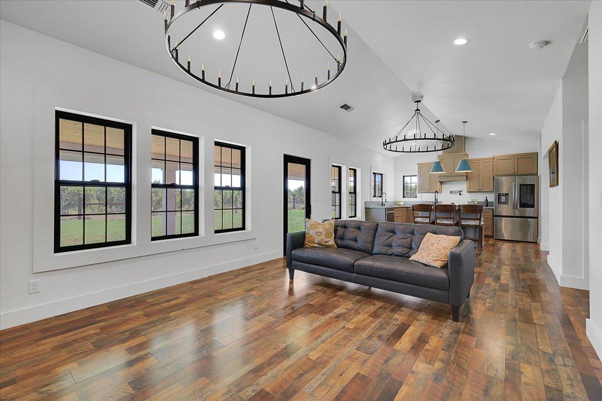 1102 Barry Road Yuba City, CA 95991 - Photo 47 of 88 a living room with furniture and kitchen view