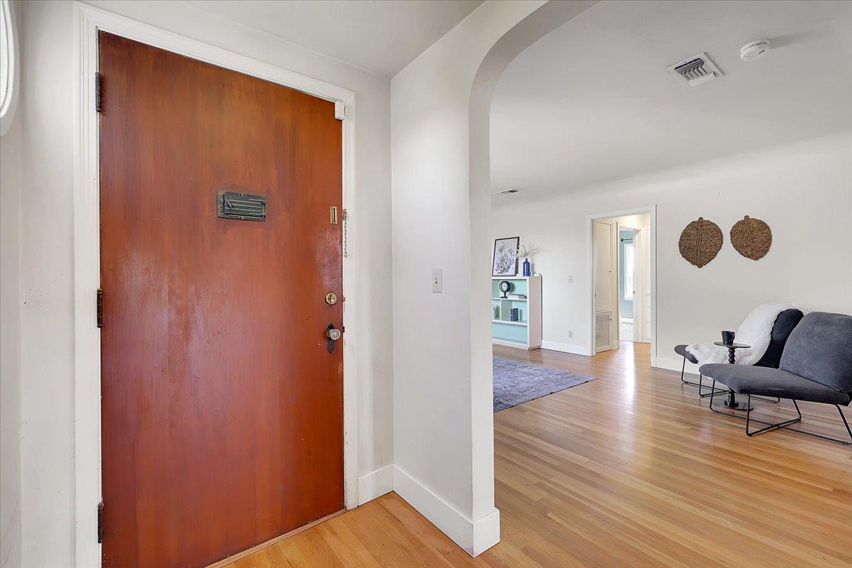 1102 Barry Road Yuba City, CA 95991 - Photo 7 of 88 a view of a livingroom with wooden floor and furniture