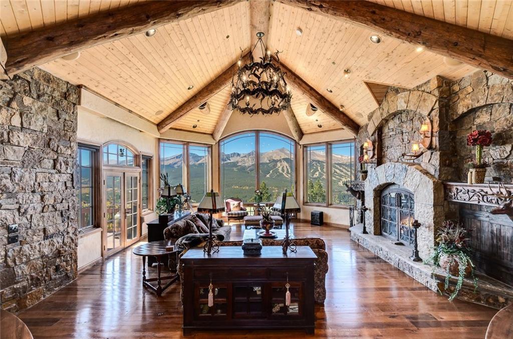 189 Juniata Circle Breckenridge, CO 80424 - Photo 2 of 35 a living room with fireplace furniture and a wooden floor