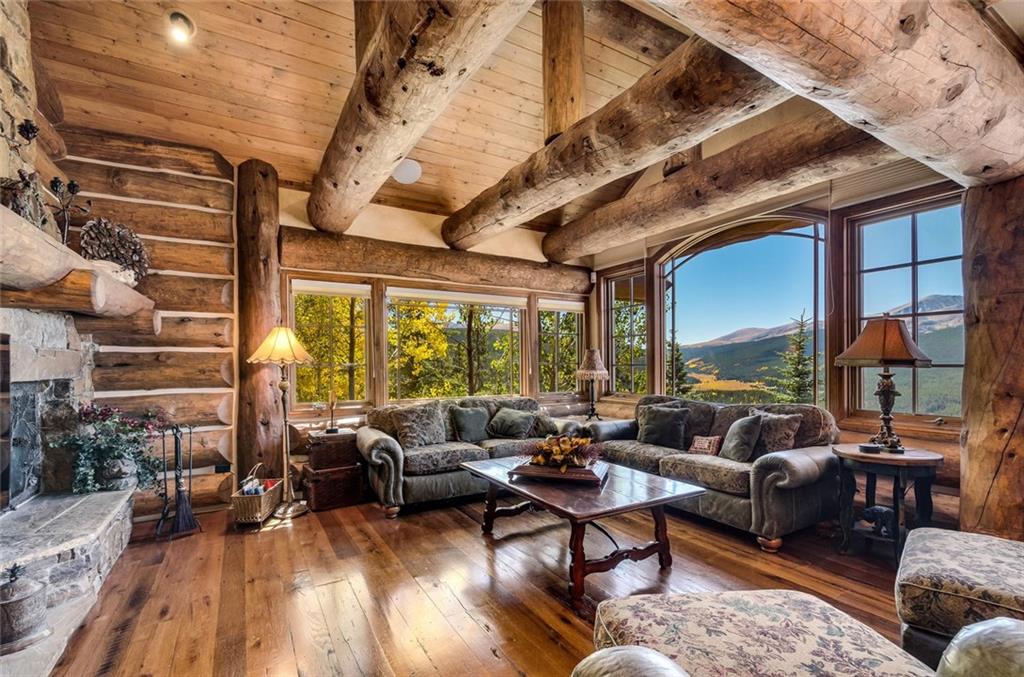 189 Juniata Circle Breckenridge, CO 80424 - Photo 16 of 35 a living room with furniture and a chandelier