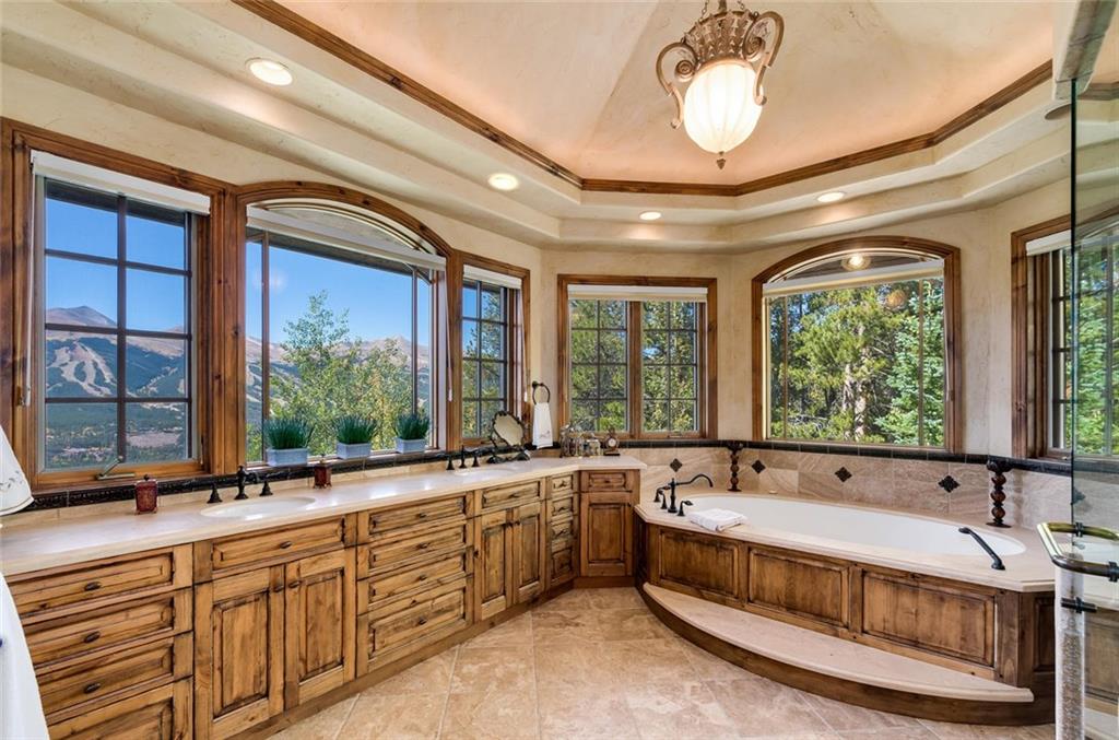 189 Juniata Circle Breckenridge, CO 80424 - Photo 20 of 35 a spacious bathroom with a large tub and sink