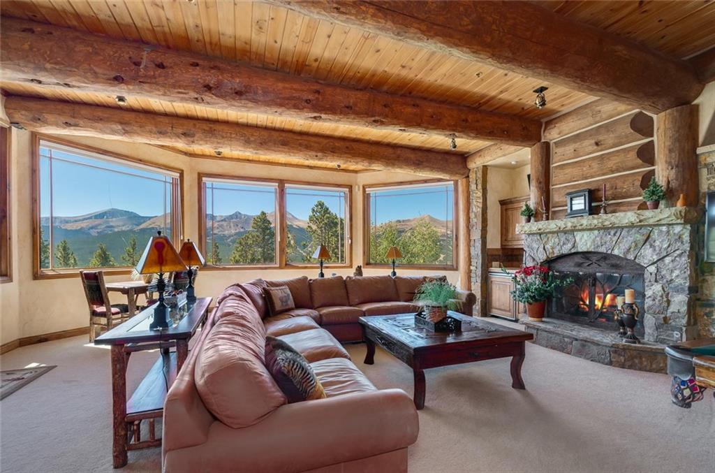 189 Juniata Circle Breckenridge, CO 80424 - Photo 25 of 35 a living room with furniture and a fireplace