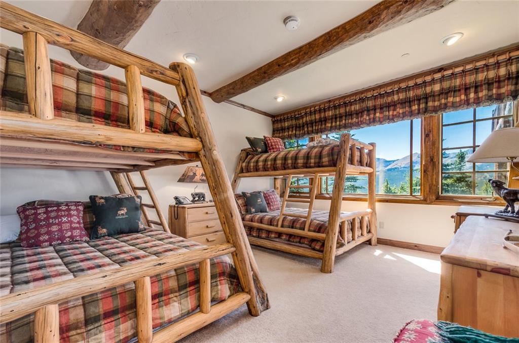 189 Juniata Circle Breckenridge, CO 80424 - Photo 29 of 35 a bedroom with furniture and large window