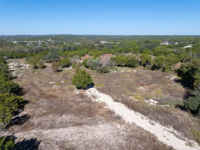 a view of an ocean beach and mountain