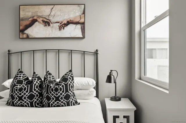 a room with a couch next to a window