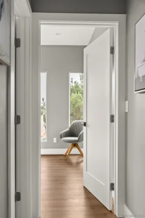 a living room with furniture and windows