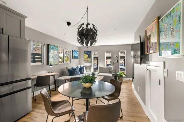 a dining room with furniture and window