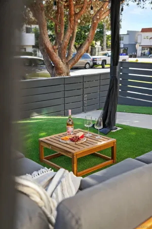 a table and chairs sitting in the garden