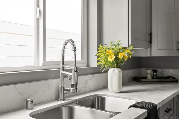 a kitchen with a sink and a window