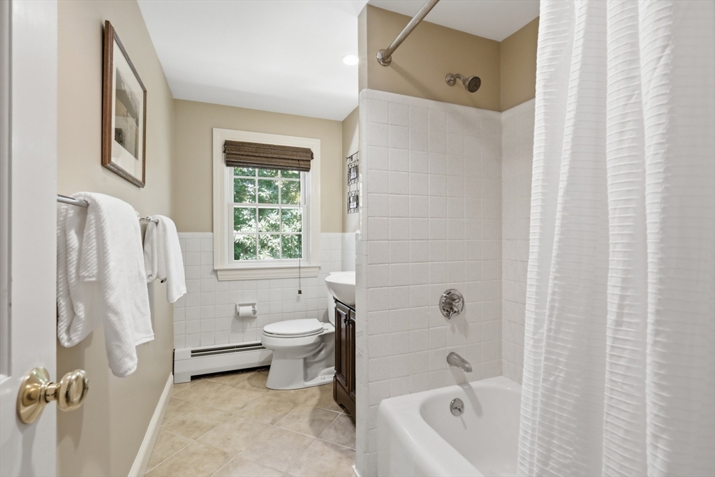 2 Olde Lyme Road Winchester, MA 01890 - Photo 19 of 42 a bathroom with a toilet sink and bathtub