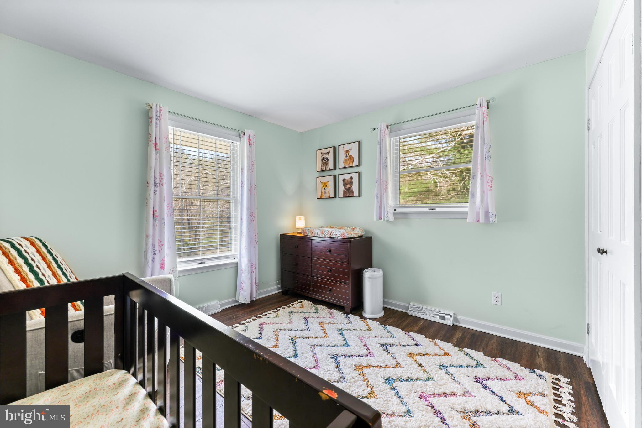 2847 Moores Road Baldwin, MD 21013 - Photo 34 of 73 a bedroom with a bed and wooden floor