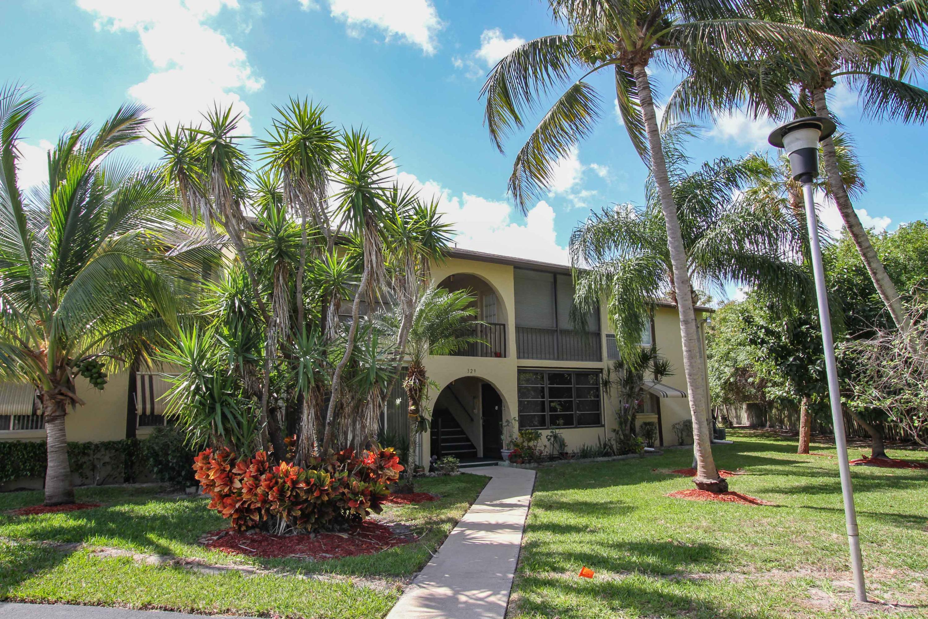 329 Pine Ridge Circle, Unit C2 Greenacres, FL 33463 - Photo 1 of 21 329 Pine Ridge Cir