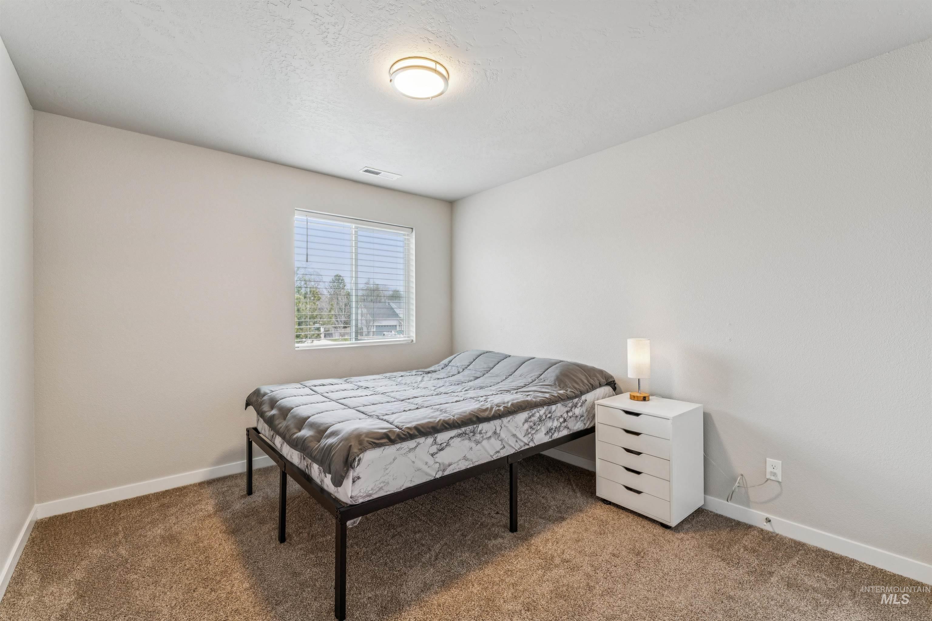 9968 West Smoke Ranch Drive Boise, ID 83709 - Photo 34 of 45 Bedroom 2