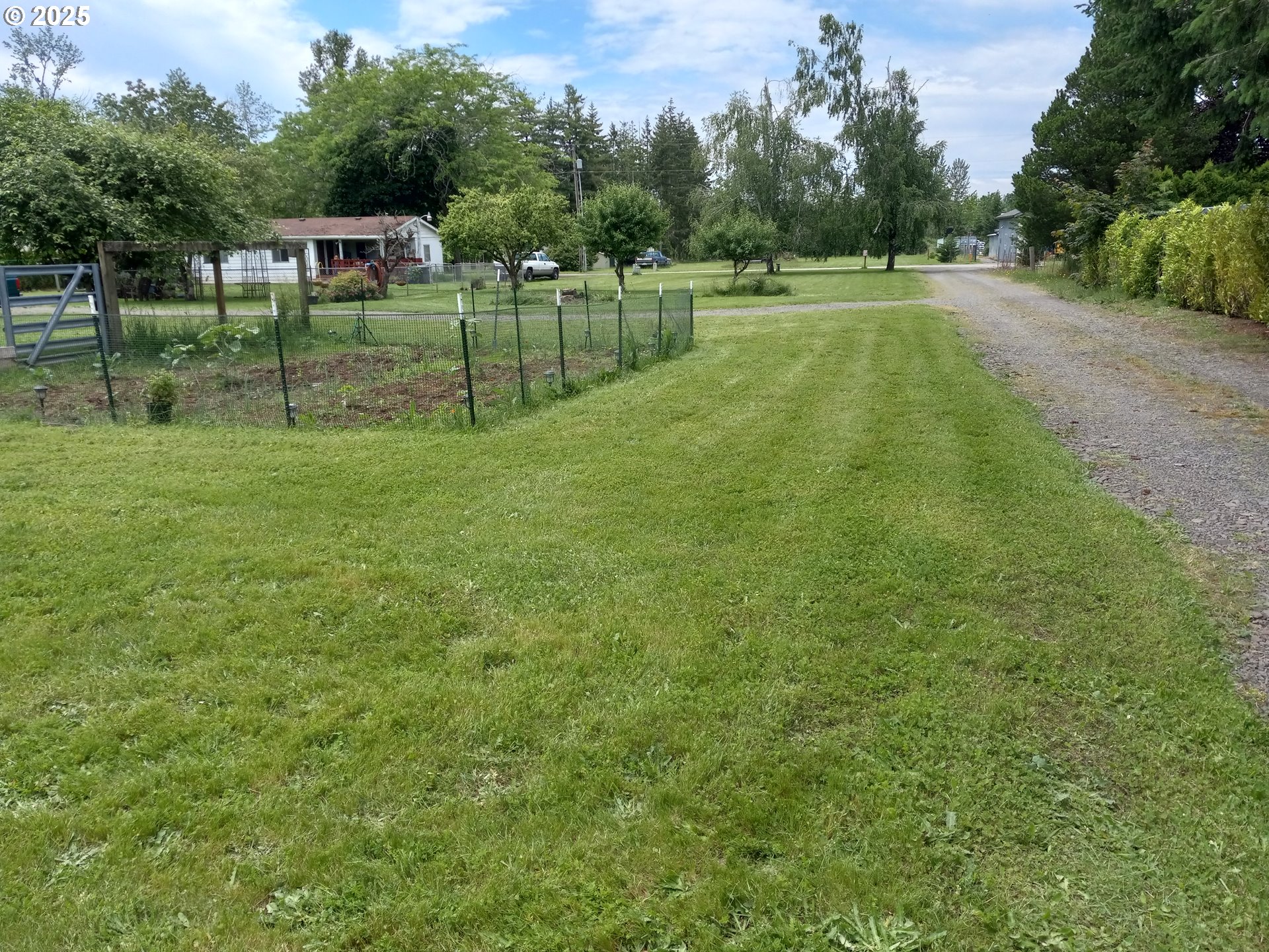 32604 South Krupicka Way Molalla, OR 97038 - Photo 14 of 18 a view of a house with a backyard