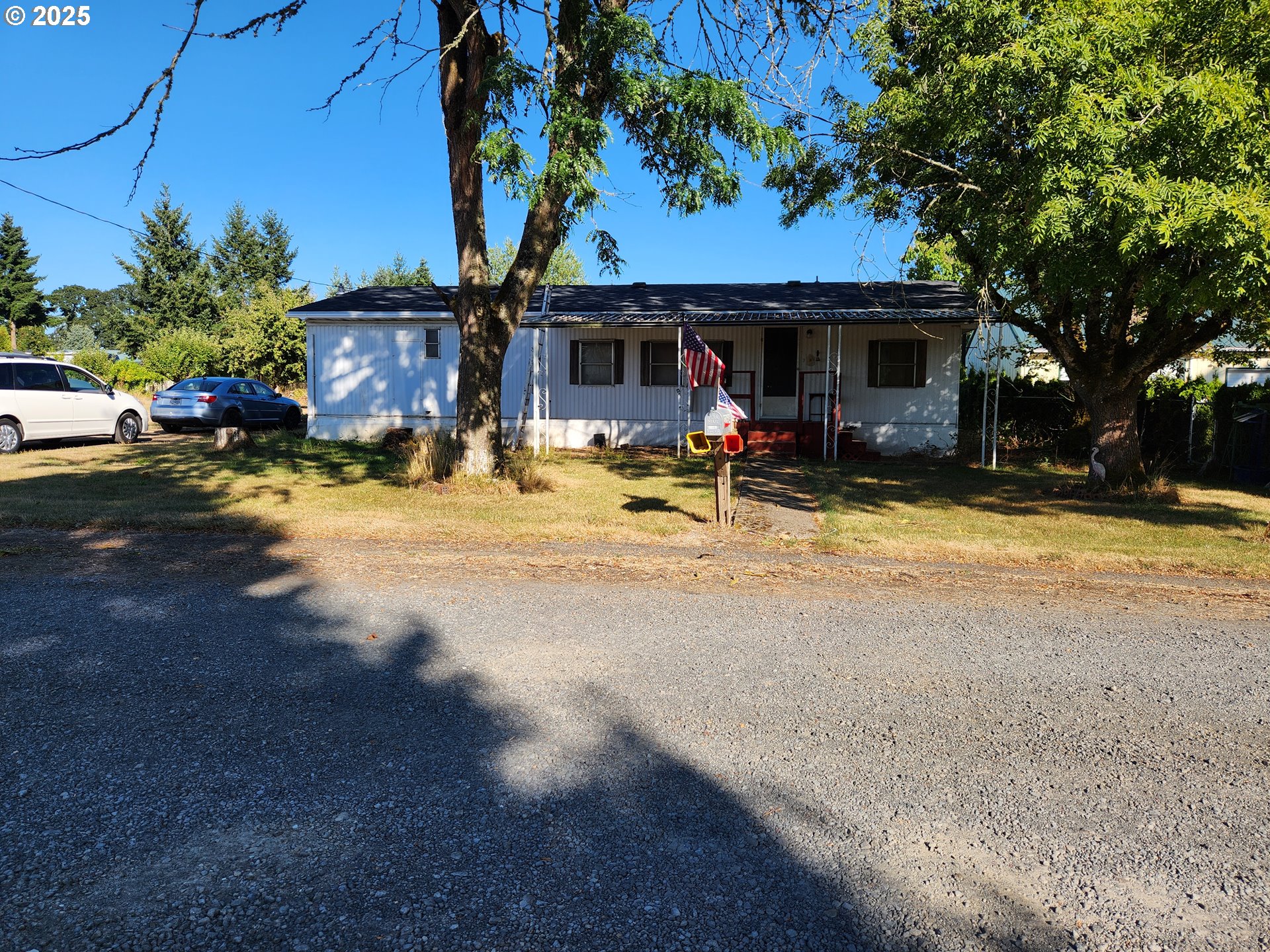 32604 South Krupicka Way Molalla, OR 97038 - Photo 2 of 18 a view of a house with backyard and sitting area