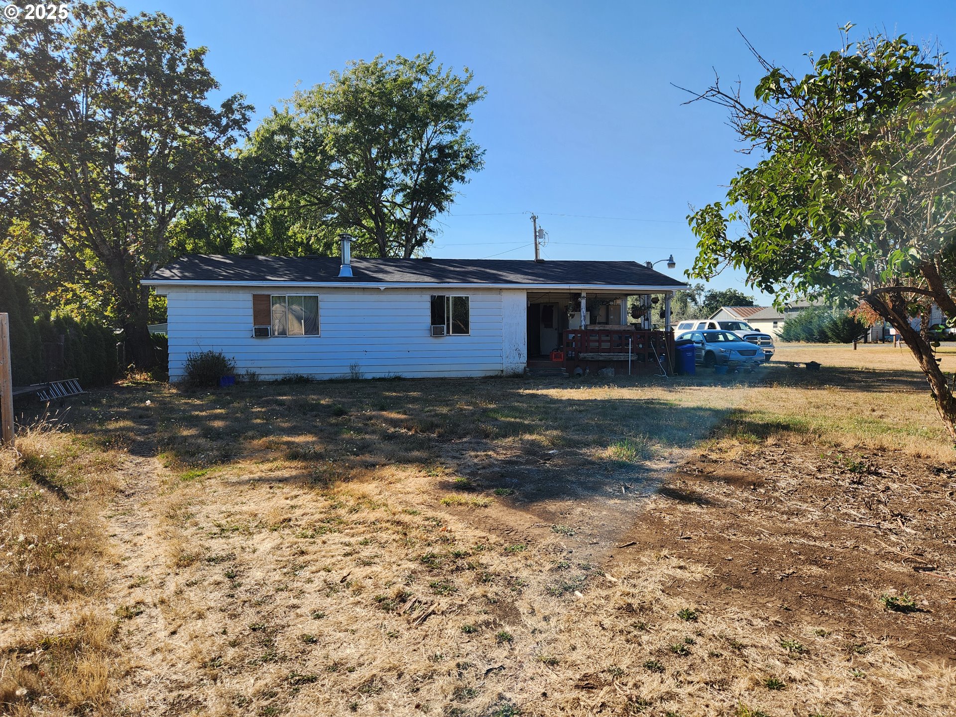 32604 South Krupicka Way Molalla, OR 97038 - Photo 3 of 18 a view of a house with a yard