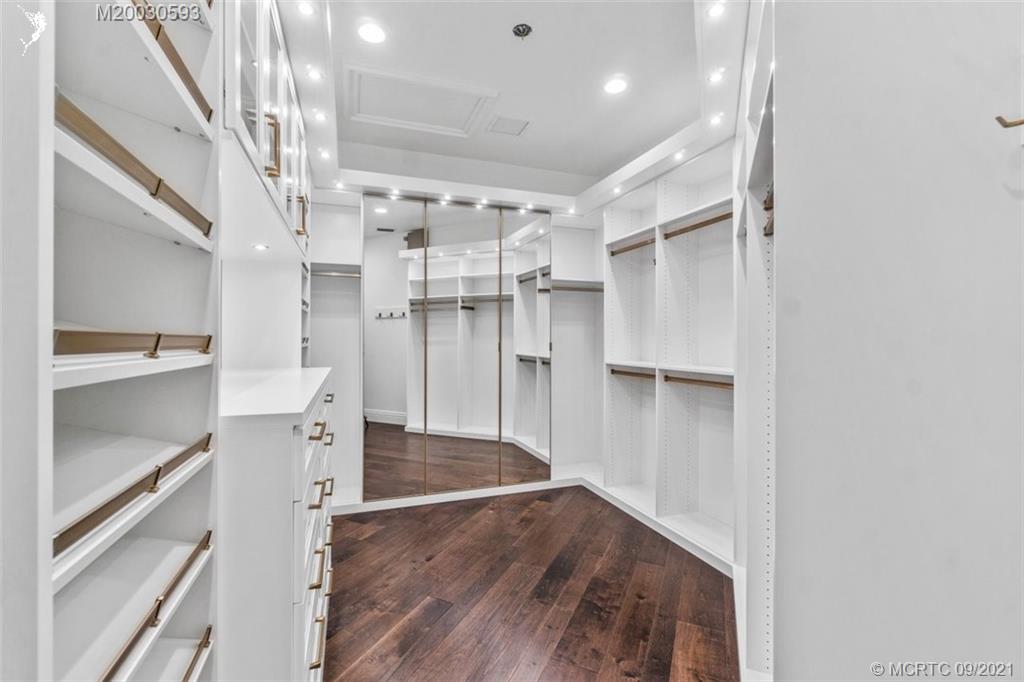 1904 Southeast Sailfish Point Boulevard Stuart, FL 34996 - Photo 23 of 72 a view of walk in closet with empty racks
