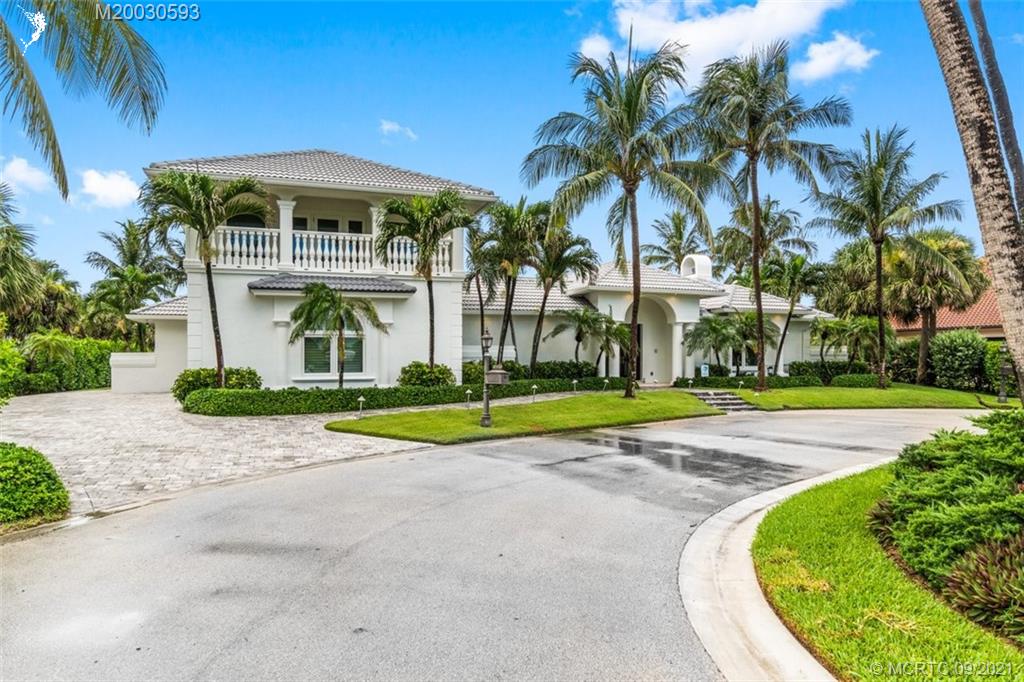 1904 Southeast Sailfish Point Boulevard Stuart, FL 34996 - Photo 55 of 72 a view of a white house with a swimming pool