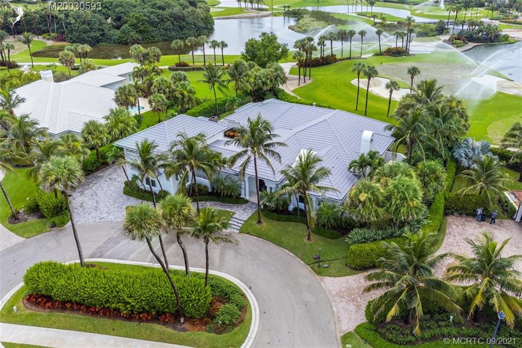 1904 Southeast Sailfish Point Boulevard Stuart, FL 34996 - Photo 60 of 72 an aerial view of a house with a yard and lake view