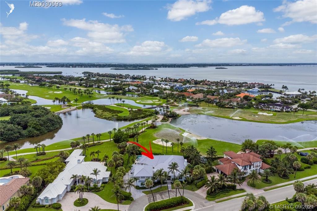 1904 Southeast Sailfish Point Boulevard Stuart, FL 34996 - Photo 69 of 72 an aerial view of residential houses with outdoor space