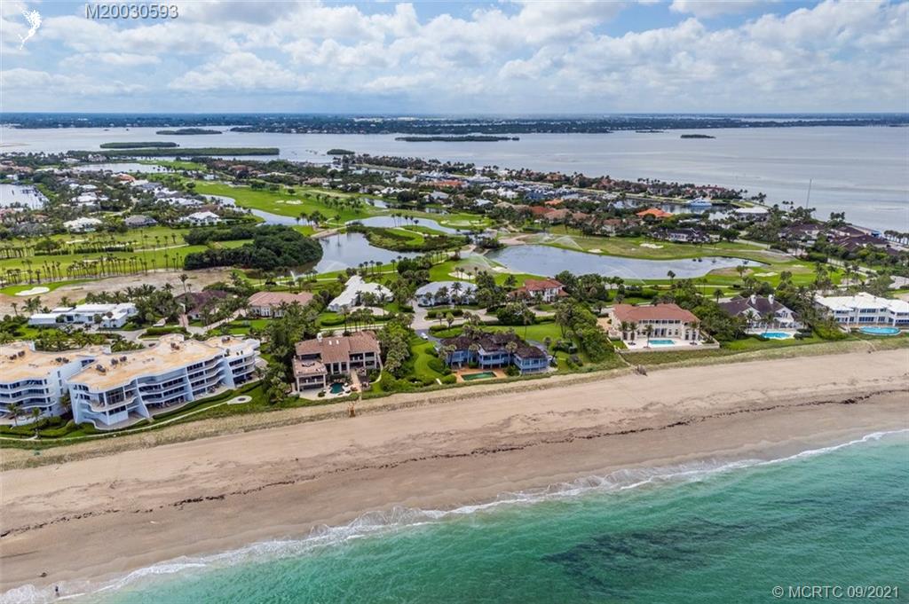 1904 Southeast Sailfish Point Boulevard Stuart, FL 34996 - Photo 72 of 72 an aerial view of multiple house