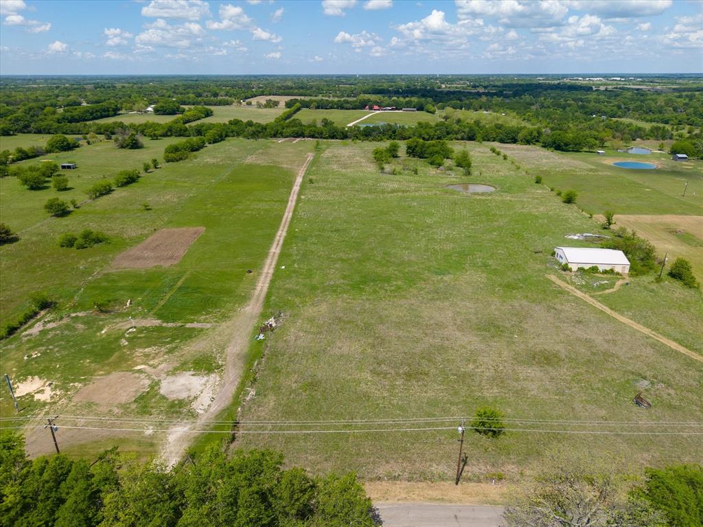 0 Rains County Road 1610 Lone Oak, TX 75453 - Photo 2 of 6 a view of a lake with a yard