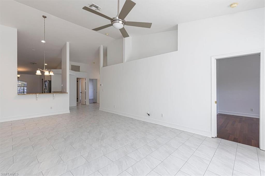 5446 Whitten Drive, Unit 19 Naples, FL 34104 - Photo 15 of 24 a view of a hallway with a bathroom