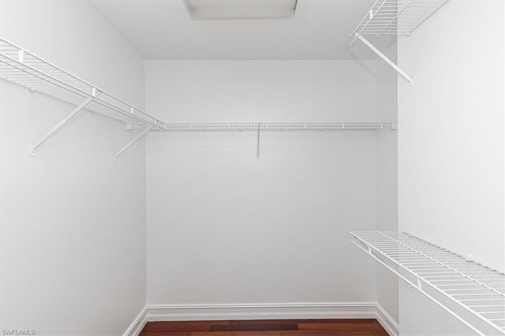 5446 Whitten Drive, Unit 19 Naples, FL 34104 - Photo 17 of 24 a view of small space with racks on the wall