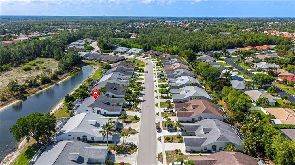 5446 Whitten Drive, Unit 19 Naples, FL 34104 - Photo 4 of 24 an aerial view of multiple house
