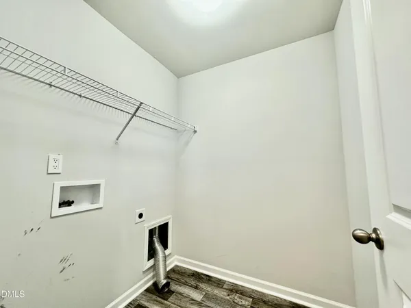 a view of a room with rack on the wall