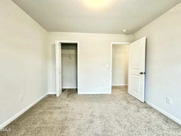 an empty room with a natural light