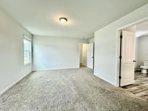 an empty room with a natural light