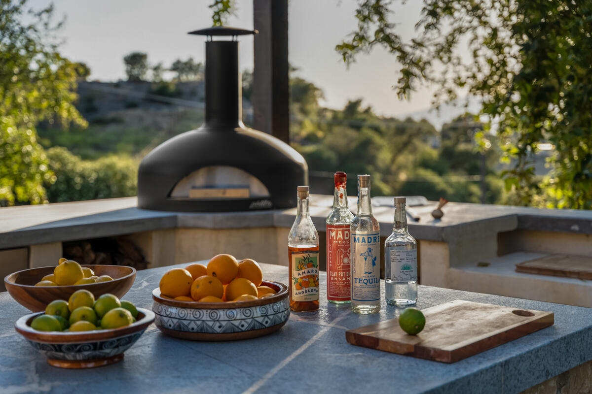 13100 Ojai Road Santa Paula, CA 93060 - Photo 40 of 60 a kitchen with a sink and breakfast area